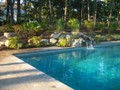 Poolside Waterfall and Patio 3 of 4